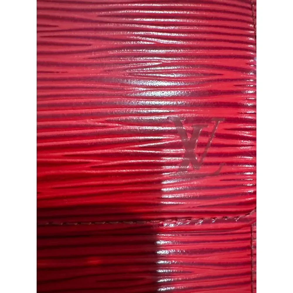 Louis Vuitton Epi International Wallet in Castilian Red